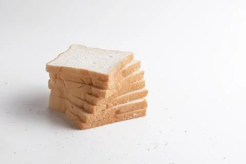 Slice of bread on the white background. Foto stock