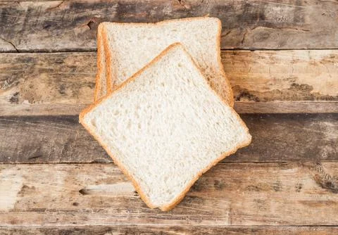 Slice bread on wooden background Foto stock