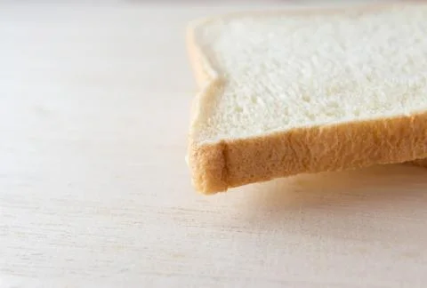 Slice  bread on a wooden table Stock Photos