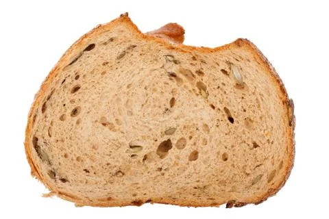 Slice of brown seedy bread Stock Photos