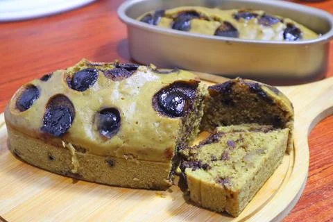 Slice cake with chocolate background Stock Photos