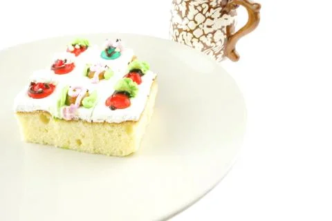 Slice cake on dish isolated Stock Photos