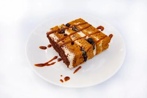 A slice of cake on a plate Stock Photos