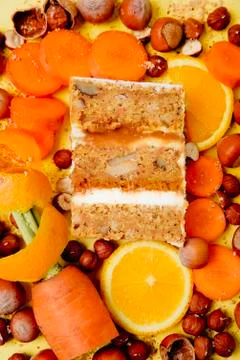 Slice of cake in the section on the background of fruit Stock Photos