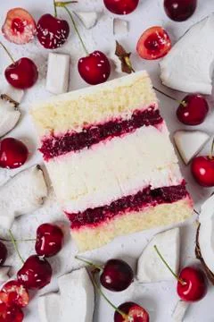 Slice of cake in the section on the background of fruit Stock Photos