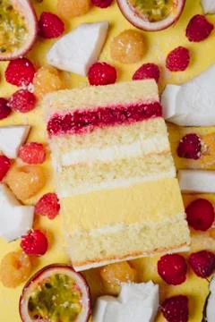 Slice of cake in the section on the background of fruit Stock Photos