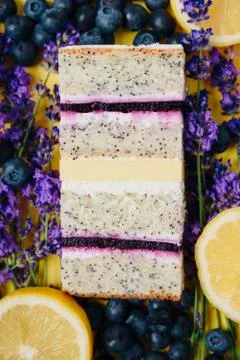 Slice of cake in the section on the background of fruit Stock Photos