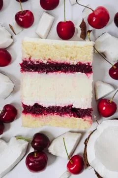 Slice of cake in the section on the background of fruit Stock Photos