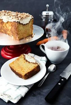 Slice of carrot cake with tea Stock Photos