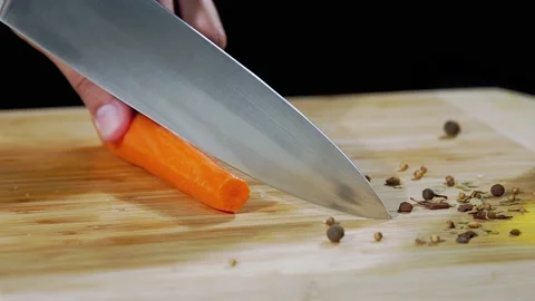 Slice the carrot close-up Stock Footage 219809732
