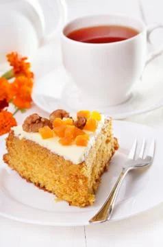Slice of carrot pie with icing Stock Photos