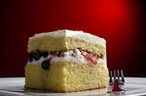 Slice of chantilly cake Stock Photos