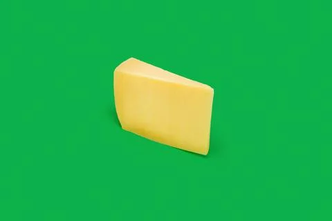Slice of cheese on a colored background Stock Photos