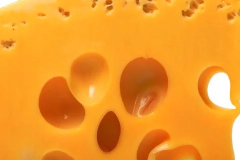 Slice of cheese with hole Foto stock