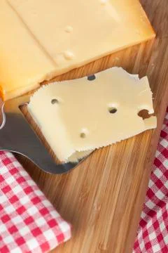 Slice of cheese Stock Photos