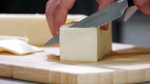 Slice cheese slow motion Stock Footage 140600005