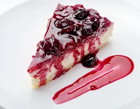 Slice of cheesecake Stock Photos