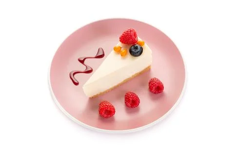 Slice of cheesecake with raspberries Stock Photos