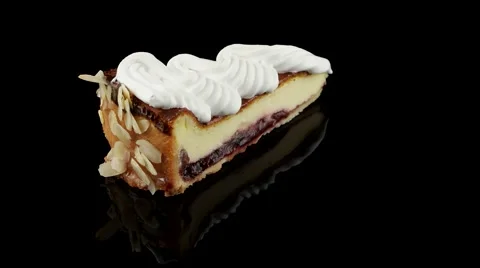 Slice of cheesecake with whipped cream Stock Footage 58596193