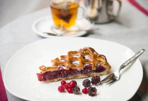Slice of cherry tart Stock Photos