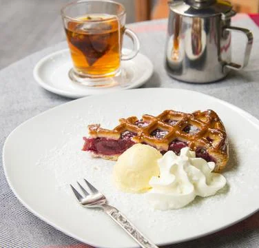 Slice of cherry tart Stock Photos