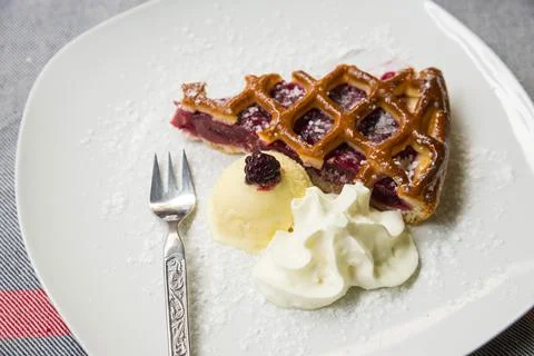 Slice of cherry tart Stock Photos