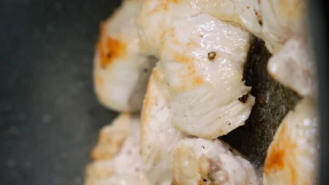 Slice of Chicken Breast in Frying Pan. Fried in Oil. Vertical Video. Cook Home Stock Footage 147348617