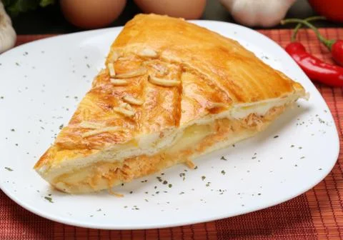 Slice of chicken pie served on dish Stock Photos