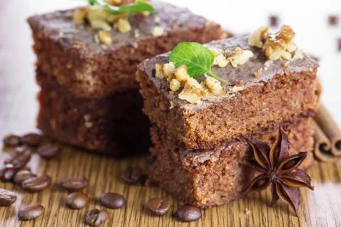 Slice of chocolate cake with nuts. small depth of field (dof) Stock Photos