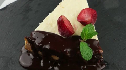 Slice of chocolate cheesecake (loop) Stock Footage 57660341
