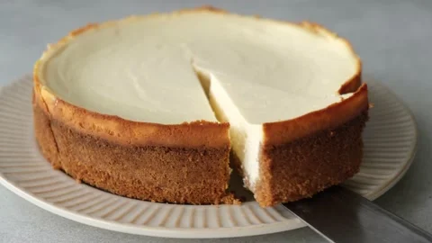 Slice of classical cheesecake Stock Footage 144052711