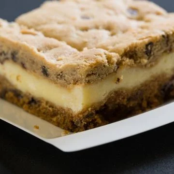 A slice of a coffee cake on a plate Stock Photos