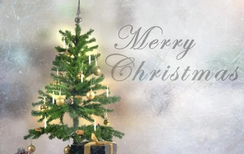 A slice covered with ice behind it a decorated Christmas tree Stock Photos