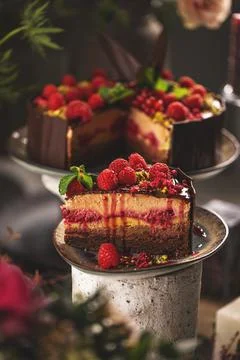 Slice of delicious layered mousse cake Stock Photos