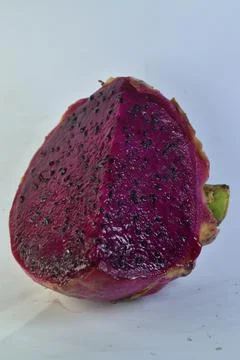Slice of dragon fruit , pitaya or pitahaya isolated on white background Stock Photos