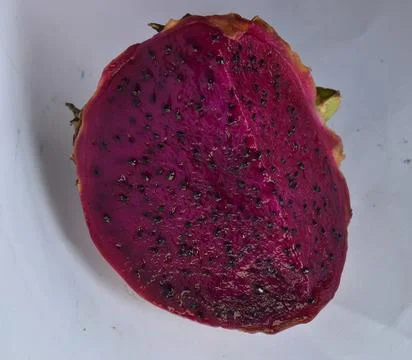 Slice of dragon fruit , pitaya or pitahaya isolated on white background Stock Photos