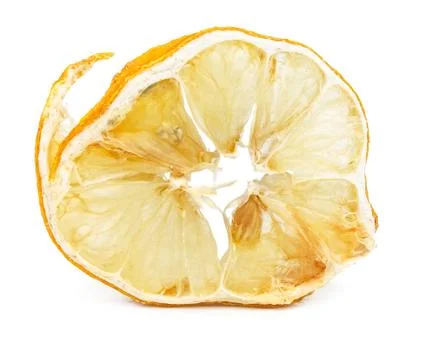 Slice of dried lemon isolated Stock Photos