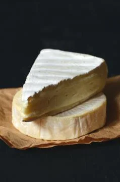 A Slice of Fresh Brie cheese Stock Photos