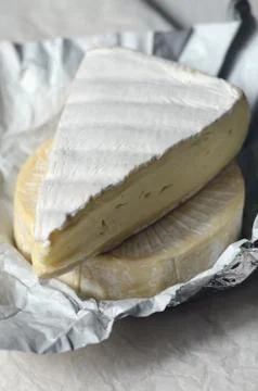 A Slice of Fresh Brie cheese Stock Photos