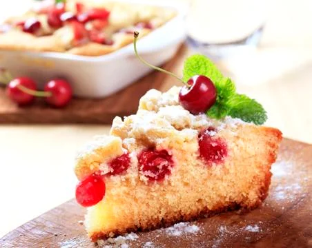 Slice of fresh cherry sponge cake Stock Photos