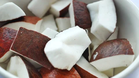 Slice of fresh coconut on a table cloth Stock Footage 237271169