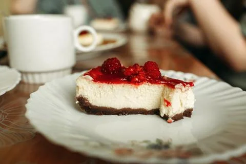 A slice of fresh raspberry pie with cream cheese. Stock Photos