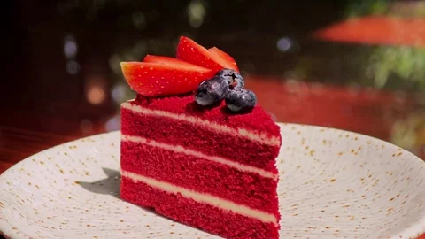 Slice of fresh red velvet cake. Stock Footage 307920239
