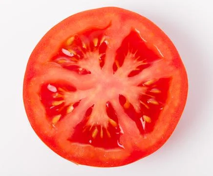 Slice of fresh tomato closeup, isolated on white, Stock Photos
