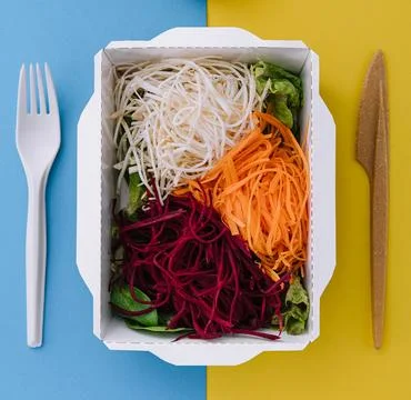 Slice fresh vegetables on launch box Stock Photos