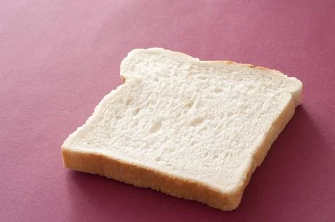 Slice of fresh white bread Stock Photos