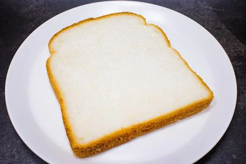Slice of fresh white toast bread 写真素材