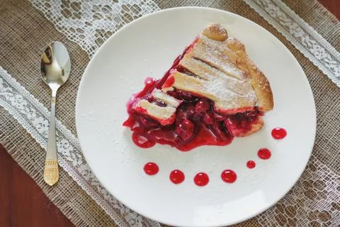 Slice of fruit pie with cherries Stock Photos