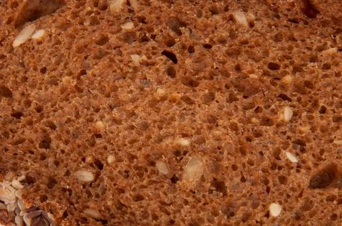 Slice of grain bread macro texture Stock Photos