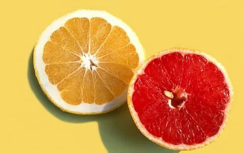Slice of grapefruit citrus fruit Stock Photos